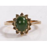 9 carat gold and green stone ring, the head set with a claw mounted cabochon cut green stone