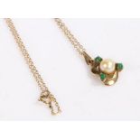 9 carat gold chain link necklace and pendant, the pendant set with a central pearl surrounded by
