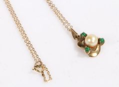 9 carat gold chain link necklace and pendant, the pendant set with a central pearl surrounded by