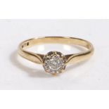 9 carat and diamond solitaire ring, the illusion set single brilliant cut diamond weighing 0.18