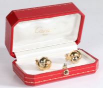 A pair of Cartier 'noeud Anglais' Trinity knot clip earrings, in 18 carat white, yellow and rose