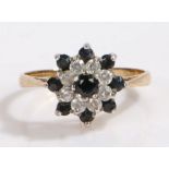 9 carat gold paste and black stone ring, the head in the form of a flower set with paste and black