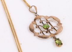 9 carat gold chain link necklace and pendant, the pendant set with light green stones, weight 4.2