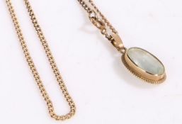 9 carat gold chain link necklace and pendant, the pendant set with a oval cut clear stone, gross