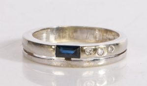 9 carat white gold, sapphire and diamond ring, the horizontal pierced band set with a single