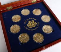 Eight Cook Islands one dollar coins 2007, depicting the life of Nelson, all capsulated and housed in