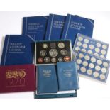 Collection of coin sets to include the complete set of shillings 1953-66, the complete set of George