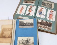Early 20th century postcard album with contents and a scrap book with part contents of cut-out