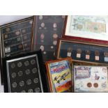 Framed coin and stamp displays, to include The Millenium Collection- a celebration of 100 years of