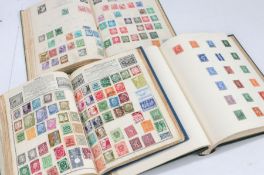 Three stamp albums, GB and World, Victoria through to Elizabeth II, to include Victoria 3d, Edward