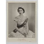 Queen Elizabeth II (Elizabeth Alexandra Mary, born 21 April 1926) three-quarter length portrait of