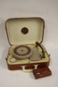 A Portayne portable suitcase record player together with a Imperial transistor radio