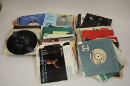 A box of 7" singles