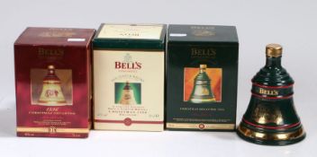 Bells Eight Year Old Scotch Whisky in Christmas decanters: Comprising 1993 (unboxed & sealed); 1995;