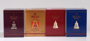 Bells Eight Year Old Scotch Whisky in Christmas decanters: Comprising 1999 to 2002 inclusive (sealed