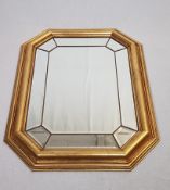 Wandspiegel - zentrale achteckige Spiegelplatte mit schräg geschliffenen Kanten, umrahmt von 8 weit