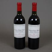 Weinkonvolut - 2 Flaschen, Château Haut Bailly 1987, Pessac-Léognan, je 0,7 Liter, Banderole leicht