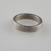 Ring - Niessing, Stahl und Platin, gestempelt „1000 /PT /Firmenmarke“, breiter Reif mit Rillendekor
