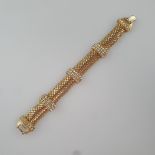 Vintage-Armband - HATTIE CARNEGIE / USA, 1950er Jahre, vergoldetes Schlangenband, darauf vertikale