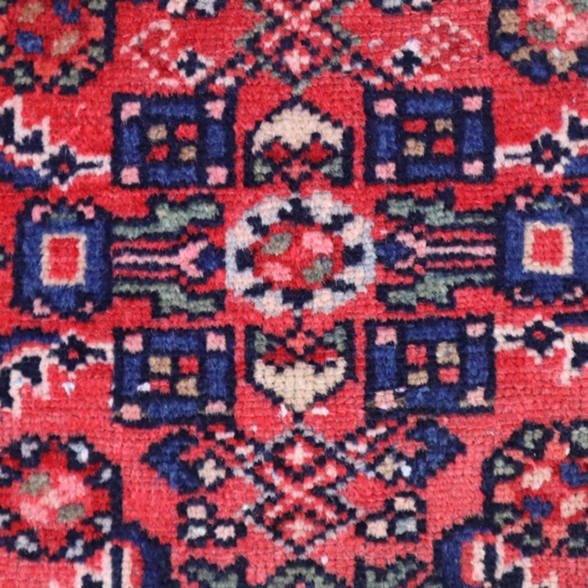 Orientteppich - Wolle, rotgrundig, ornamental gemustert, mehrfache Bordüre, u.a. mit Vogelmuster, A - Bild 5 aus 8