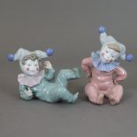 Zwei niedliche Kinderfiguren als Harlekine - Nao/Lladro, Spanien, 2.H.20.Jh., Porzellan, polychrome