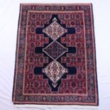 Persischer Orientteppich - Wolle, blaugrundig, ornamentales und florales Muster, mehrfache Bordüre,