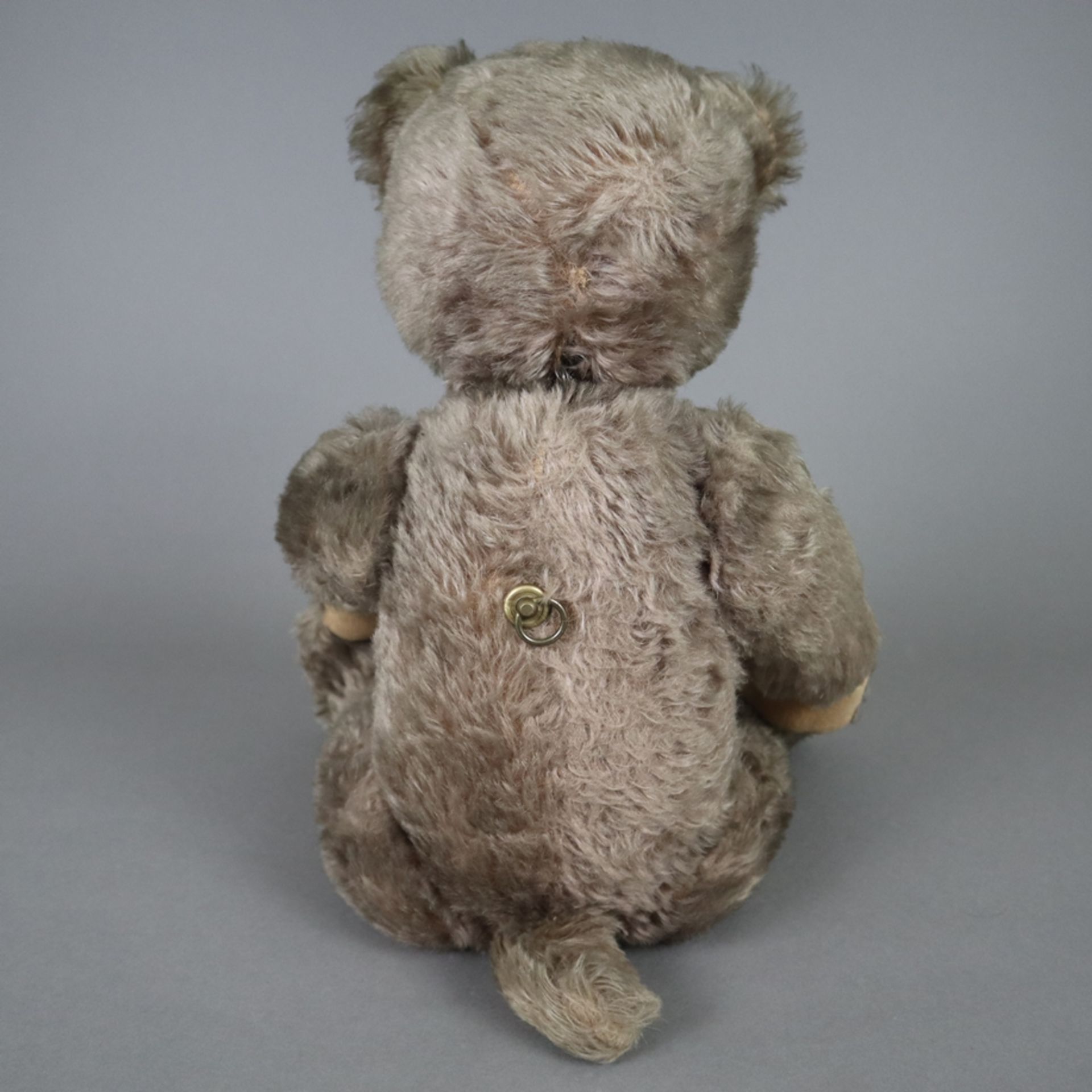 Teddy "Tricky" - Schuco, um 1950, Kunststoff-Brustschild mit Schleife, made in US Zone, Mohair, bew - Bild 8 aus 8