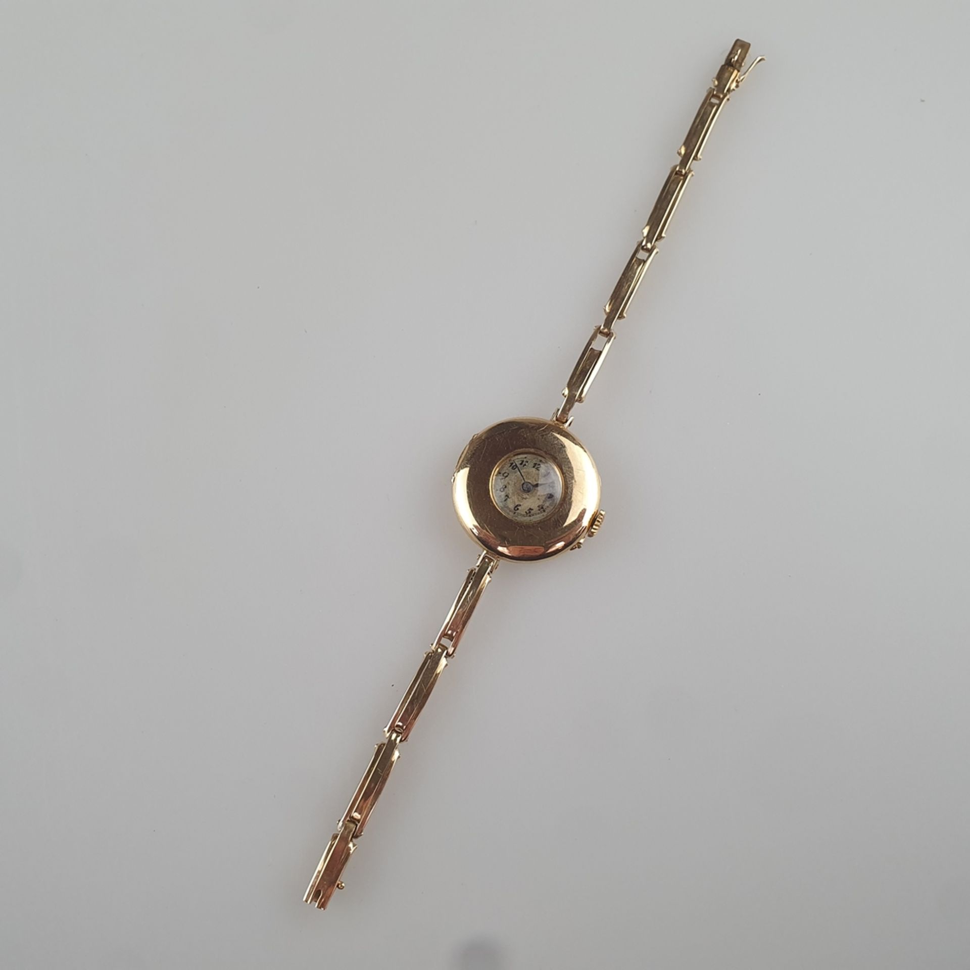 Damenarmbanduhr - Schweiz, rundes glattes Goldgehäuse, D. ca. 25mm, Rückdeckel innen gepunzt mit "1