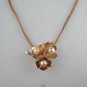Vintage-Collier mit floralem Zierelement - Henkel & Grosse (Pforzheim), vergoldetes Metall, Schlang
