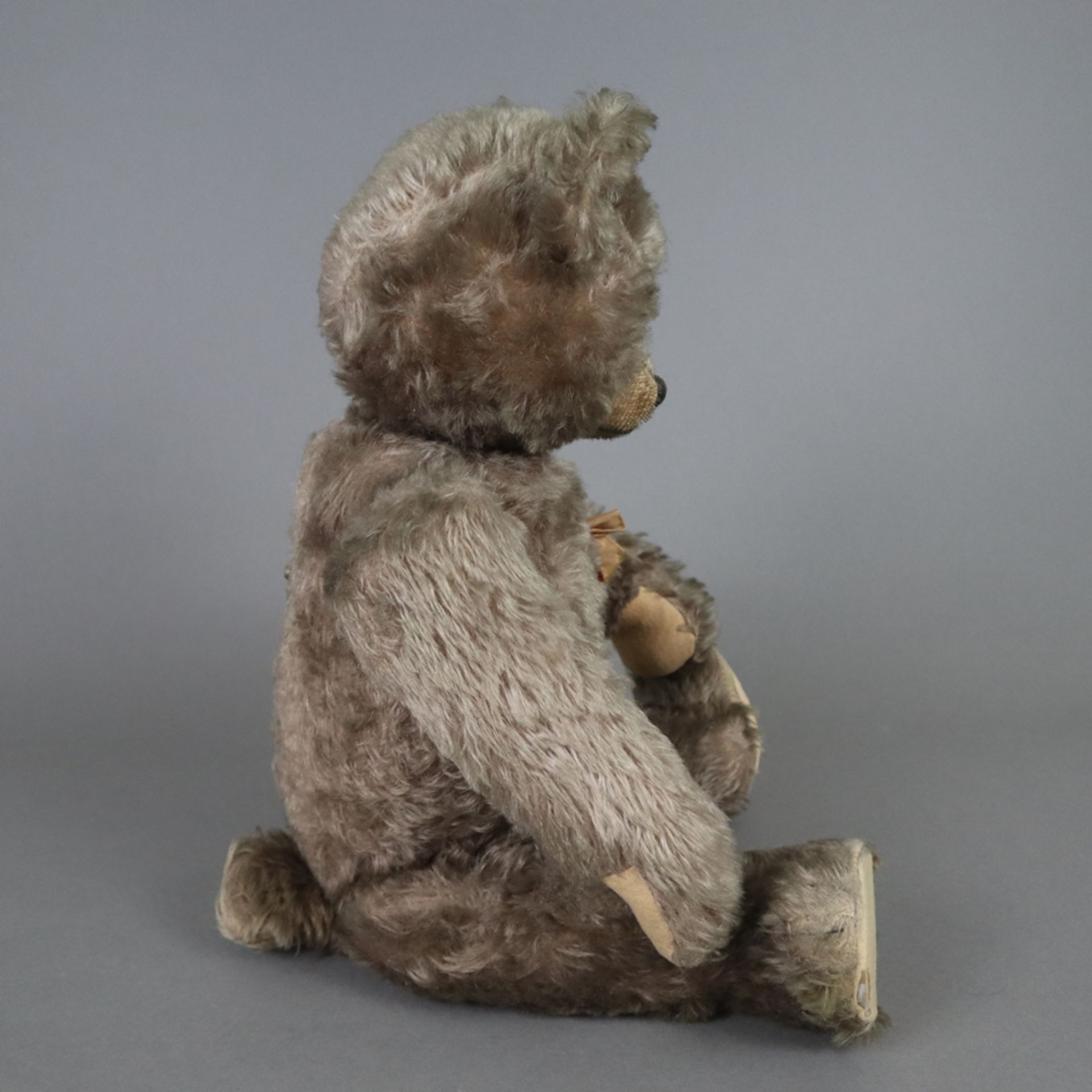 Teddy "Tricky" - Schuco, um 1950, Kunststoff-Brustschild mit Schleife, made in US Zone, Mohair, bew - Bild 7 aus 8