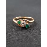 18 CARAT EMERALD AND DIAMOND RING