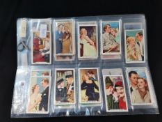 SELECTION OF CIGARETE CARDS OF FAMOUS PEOPLE AND FILM SCENES