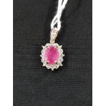 9 CARAT GOLD RUBY AND DIAMOND PENDANT