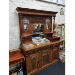 EDWARDIAN OAK MIRROR BACKED SIDEBOARD, HEAVILY CARVED