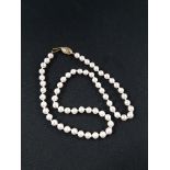 STRAND OF PEARLS WITH 9 CARAT GOLD CLASP