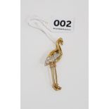 STUNNING 18 CARAT GOLD AND DIAMOND STORK BROOCH 11.7 GRAMS AND CIRCA 0.25 CARATS OF DIAMOND