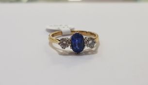 18 CARAT GOLD TANZANITE & DIAMOND RING WITH THIRD CARAT OF DIAMONDS