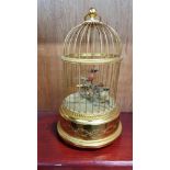SWISS EDWARDIAN MUSICAL BIRD CAGE WITH TWO BIRDS AND IN WORKING ORDER