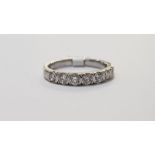 PLATINUM & DIAMOND ETERNITY RING WITH .93 CARAT OF DIAMONDS - COLOUR F/G, CLARITY SI/1