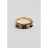 18 CARAT YELLOW GOLD DIAMOND AND SAPPHIRE RING