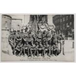 POSTCARD - IRISH REBELLION 1916 A GROUP OF OFFICERS WITH THE CAPTURED REBEL FLAG