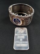 1 OUNCE SILVER INGOT (999 FINE) & SILVER CUFF BANGLE/ INSET WITH ENAMEL COIN (76 GRAMS)