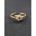 18 CARAT GOLD FLOWER HEAD RING