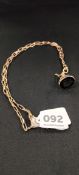 9 CARAT GOLD CHAIN WITH GOLD BRITANNIA FOB SEAL 29 GMS