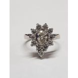 14 CARAT WHITE GOLD DIAMOND CLUSTER RING WITH CIRCA 1.5 CARAT OF DIAMONDS.