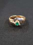 18 CARAT EMERALD RING