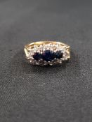 18 CARAT GOLD DIAMOND AND SAPPHIRE CLUSTER RING