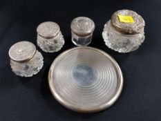 SILVER COASTER AND 4 ANTIQUE SILVER TOPPED PERFUME JARS