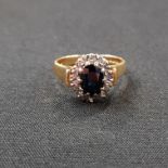 18 CARAT SAPPHIRE AND DIAMOND RING