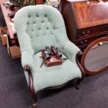 ANTIQUE SPOONBACKED ARMCHAIR